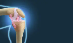 Anatomia kolana z widocznymi więzadłami, które stabilizują staw.